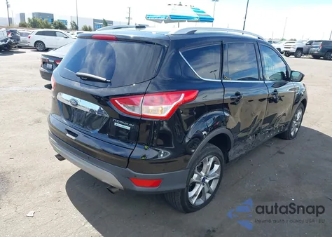 2016 Ford Escape Titanium из США, поврежденный, VIN 1FMCU0J96GUC82528